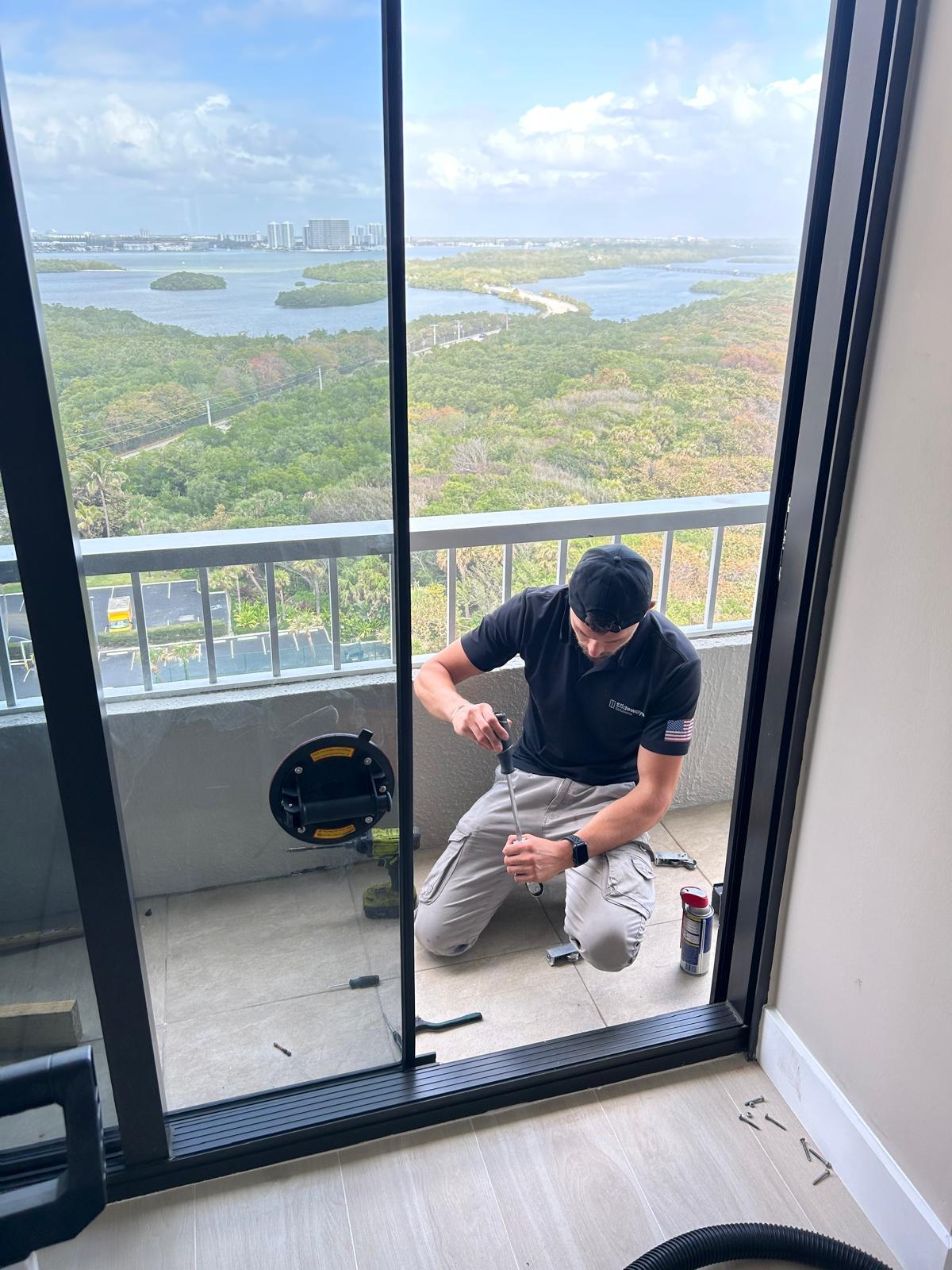 Slideways technician repairing a sliding glass door in a South Florida home